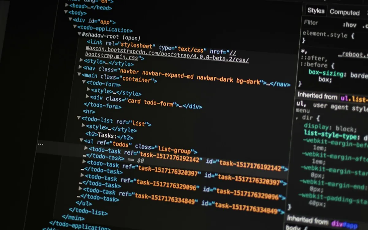 Developer workspace with code on a monitor